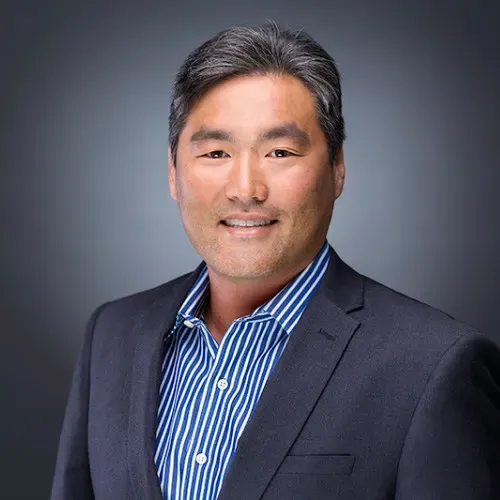 Henry Cha, co-founder and CEO of HCIactive, in a professional portrait